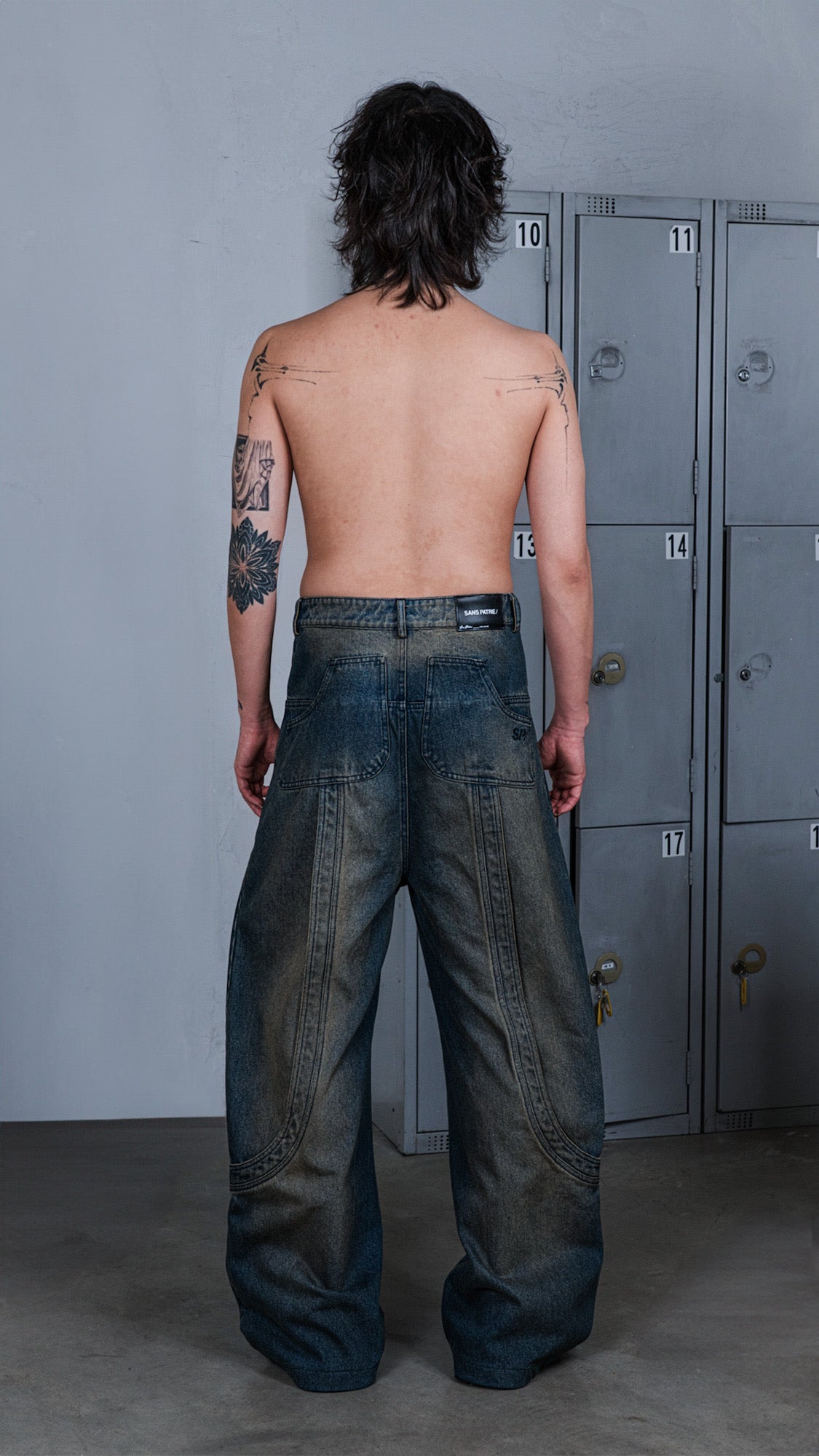 SP/ 002 WASHED SEAMED JEANS