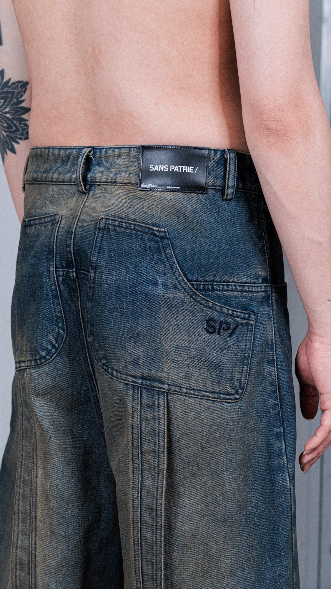 SP/ 002 WASHED SEAMED JEANS