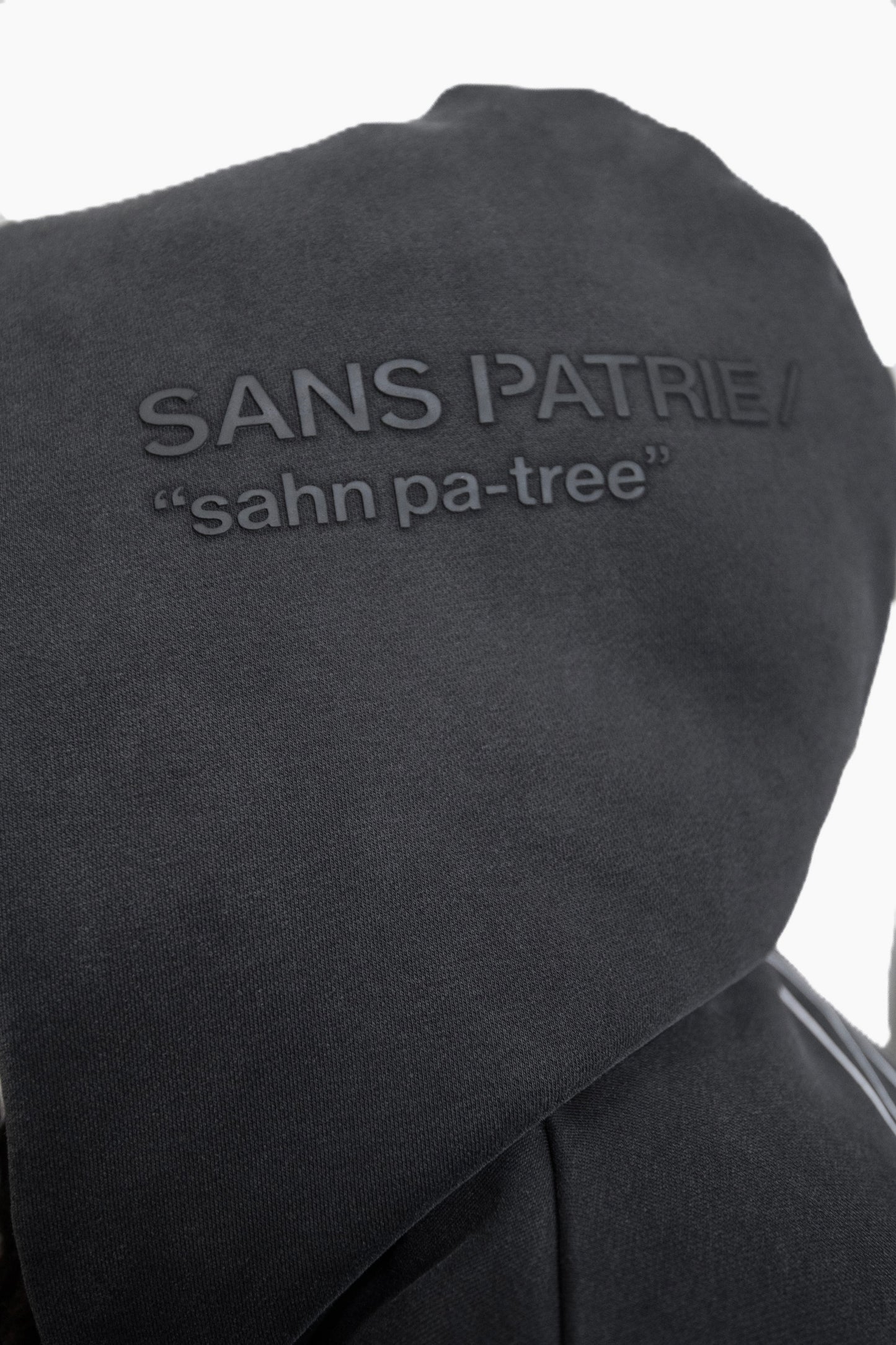 SP/  SCRIPT ZIP UP HOODIE