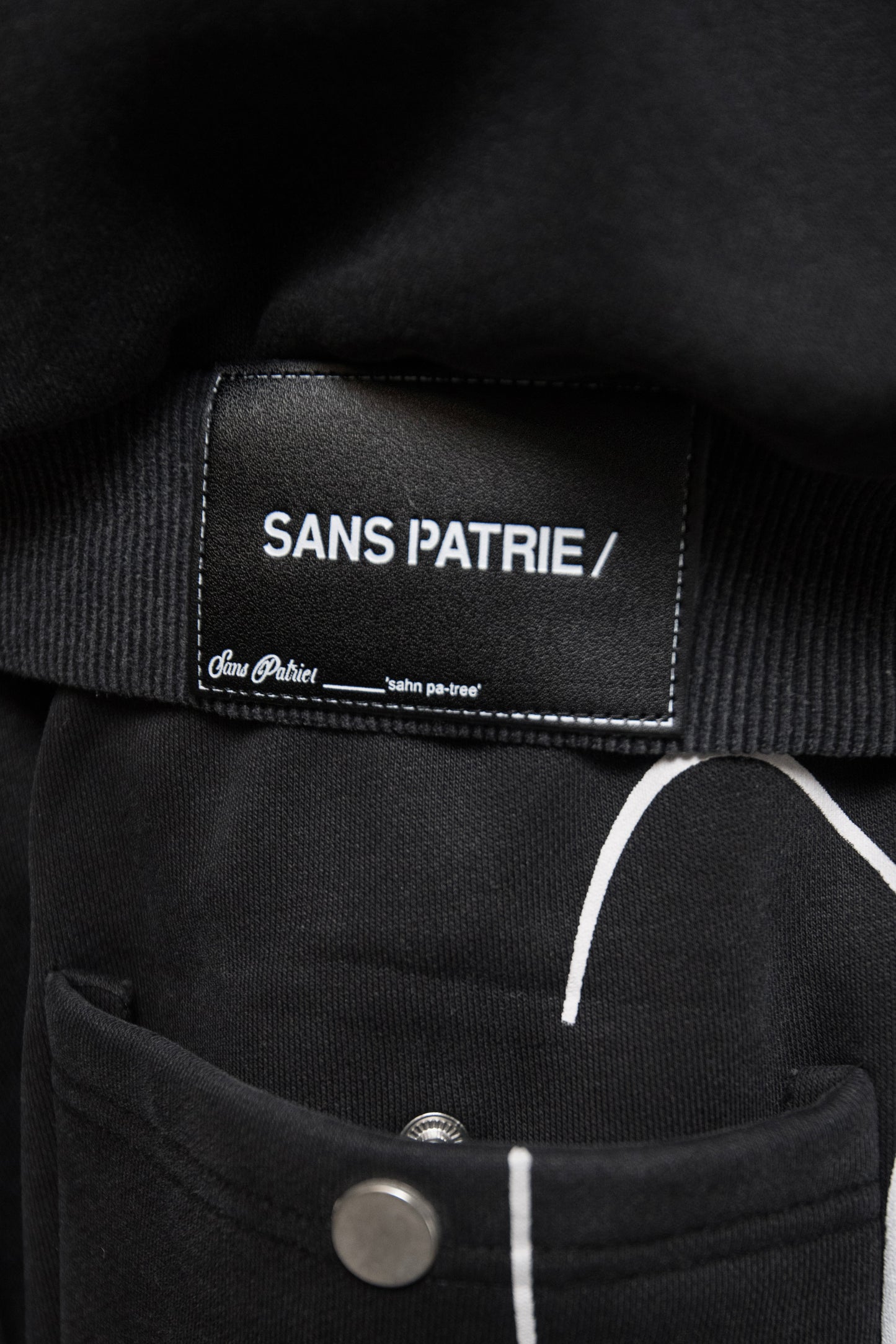 SP/  SCRIPT ZIP UP HOODIE