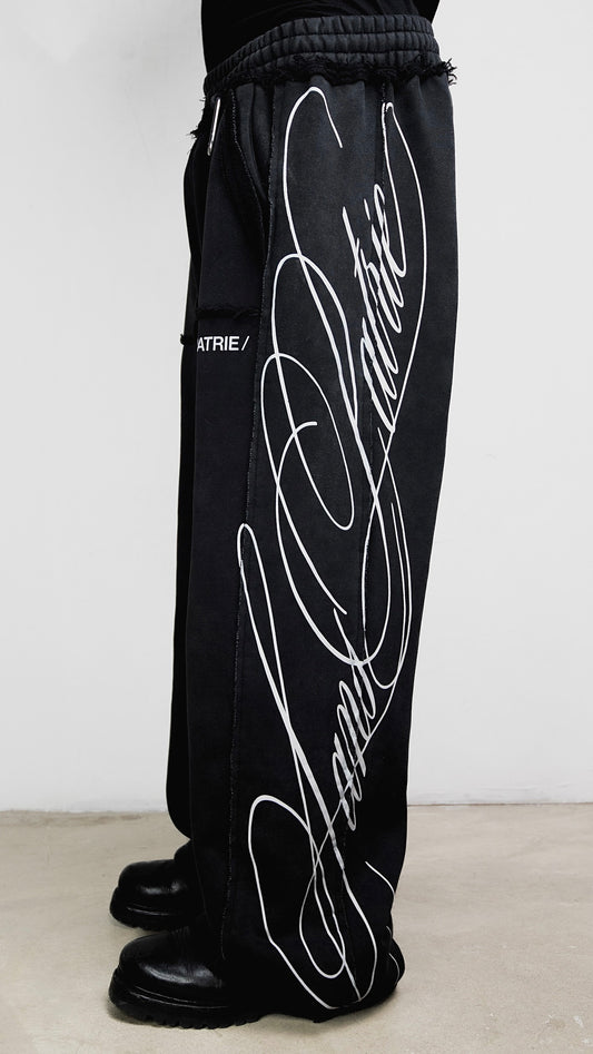 SP/ SCRIPT SWEATPANTS